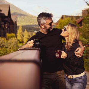 man-hugging-woman-manifesting-love-and-having-coffee Man hugging woman manifesting love and having coffee.